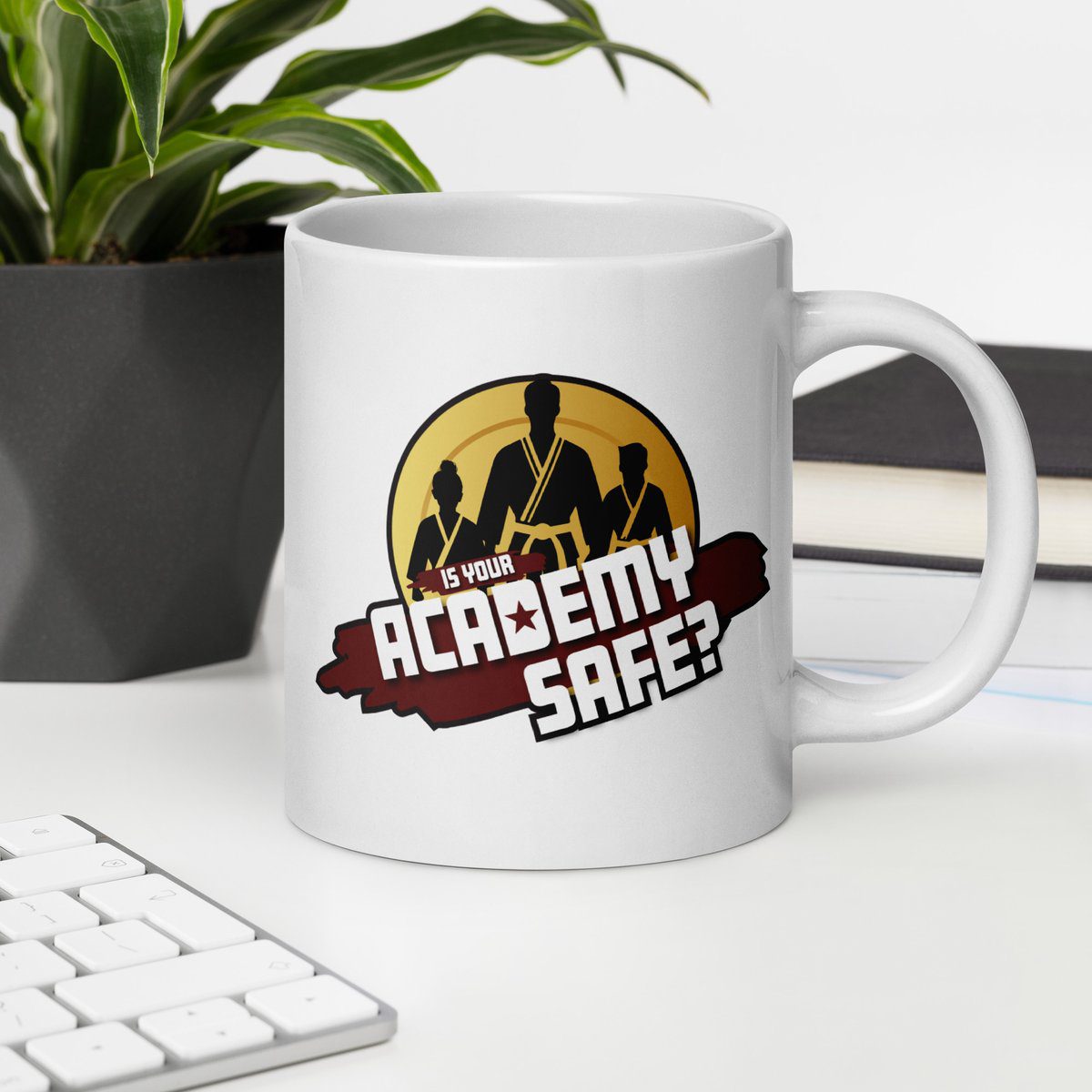 Academy Safe white glossy mug with logo on both sides, desk view